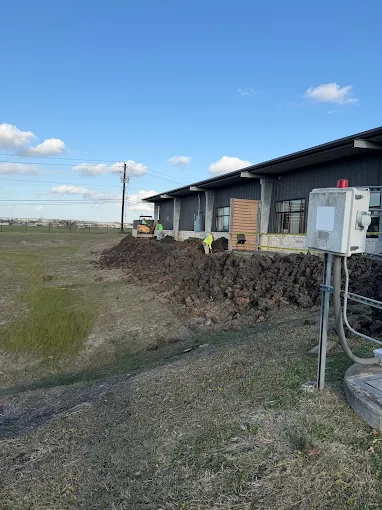 Commercial drainage excavation project in Houston TX by Leatherwood Lawn Specialists