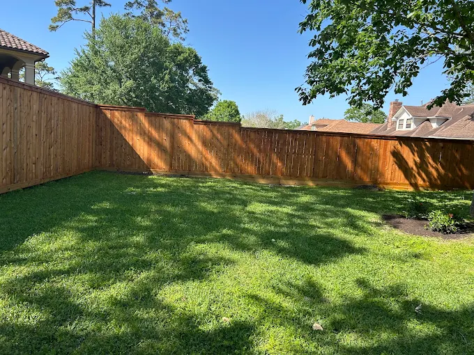 Fence building and backyard lawn project in Houston TX by Leatherwood Lawn Specialists