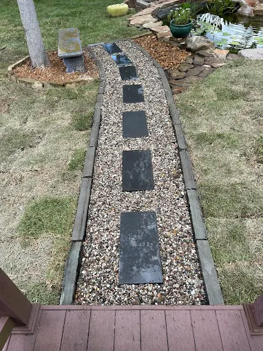 Landscape walkway and rock bed project in Houston TX by Leatherwood Lawn Specialists