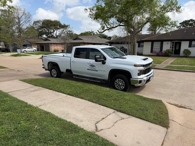 Leatherwood Lawn Specialists service truck in Houston TX