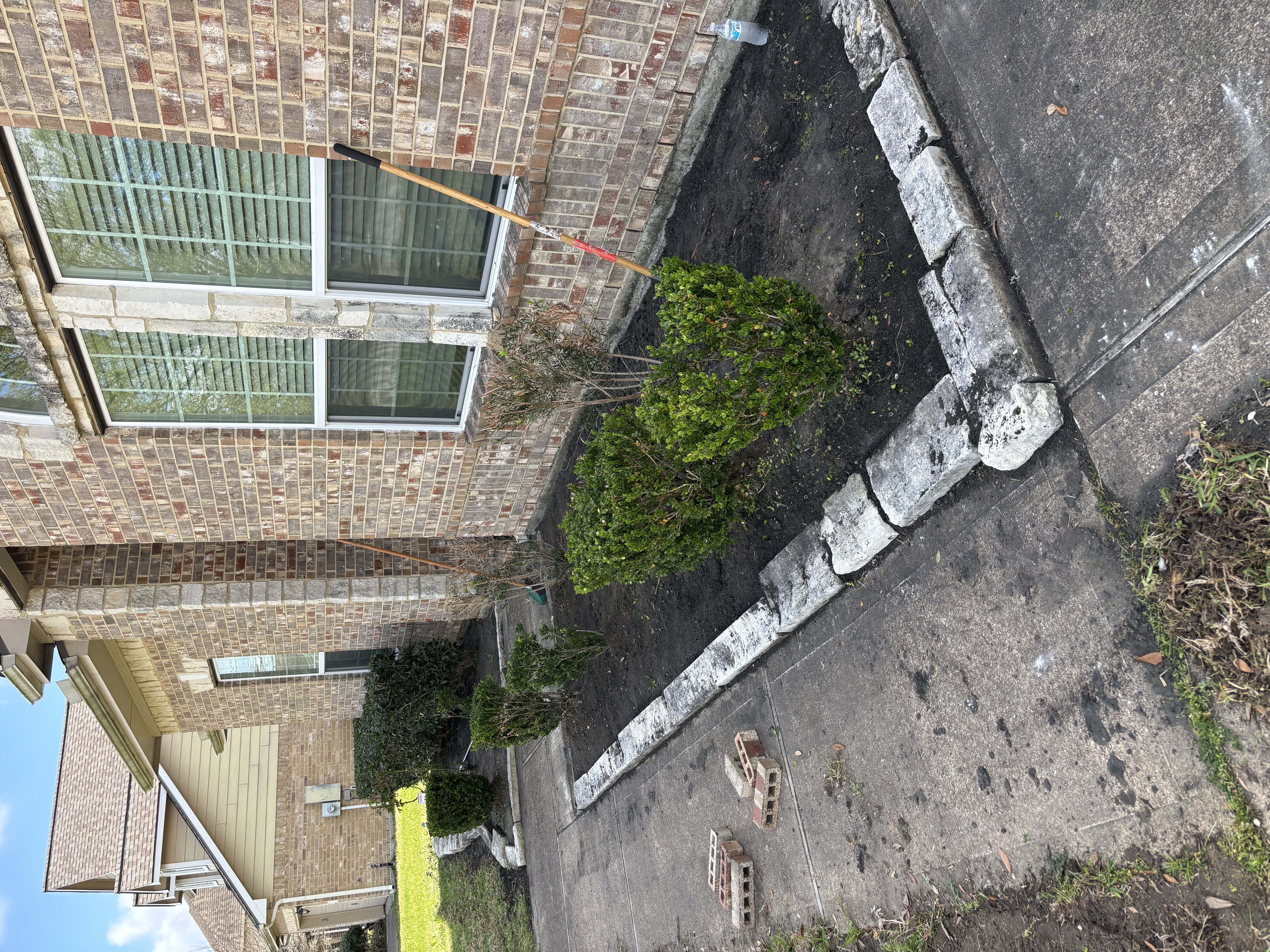 Weed control landscape bed cleanup after service in Houston TX by Leatherwood Lawn Specialists
